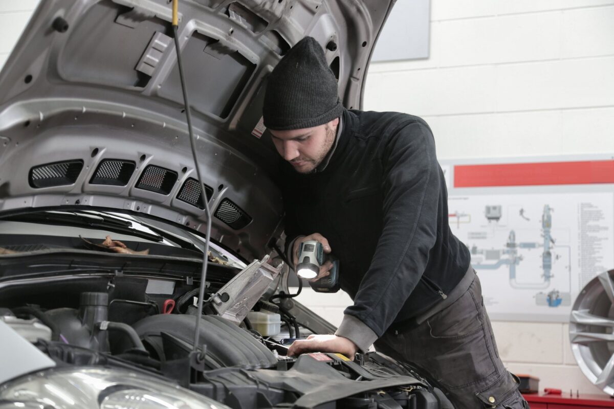 Mechanic checking an engine