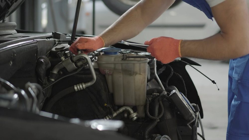 Mechanic working in the engine bay