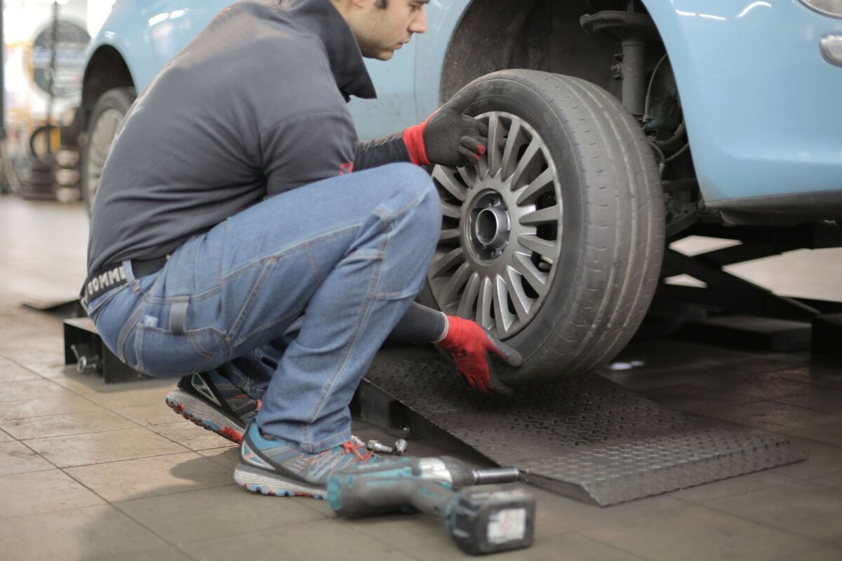 Mechanic changing a wheel
